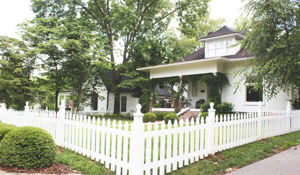 Lotus Building Group had the opportunity to custom make this white picket fence for this lovely home, as well as design and build the custom wine rack and screened in porch! Contact us for your historic home restoration contractor in Nashville, TN.