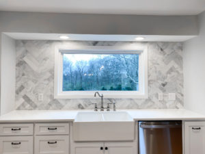 Residential kitchen renovation project. This kitchen features white cupboards and stainless steel accent fixtures. Contact Lotus Building Group as your kitchen remodel contractor in Nashville, TN.