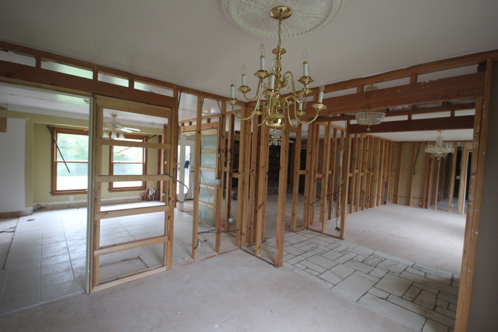 Before version of a home renovation project. This features wooden frame of new rooms. Contact Lotus Building Group as your home renovation contractor in Nashville, TN.