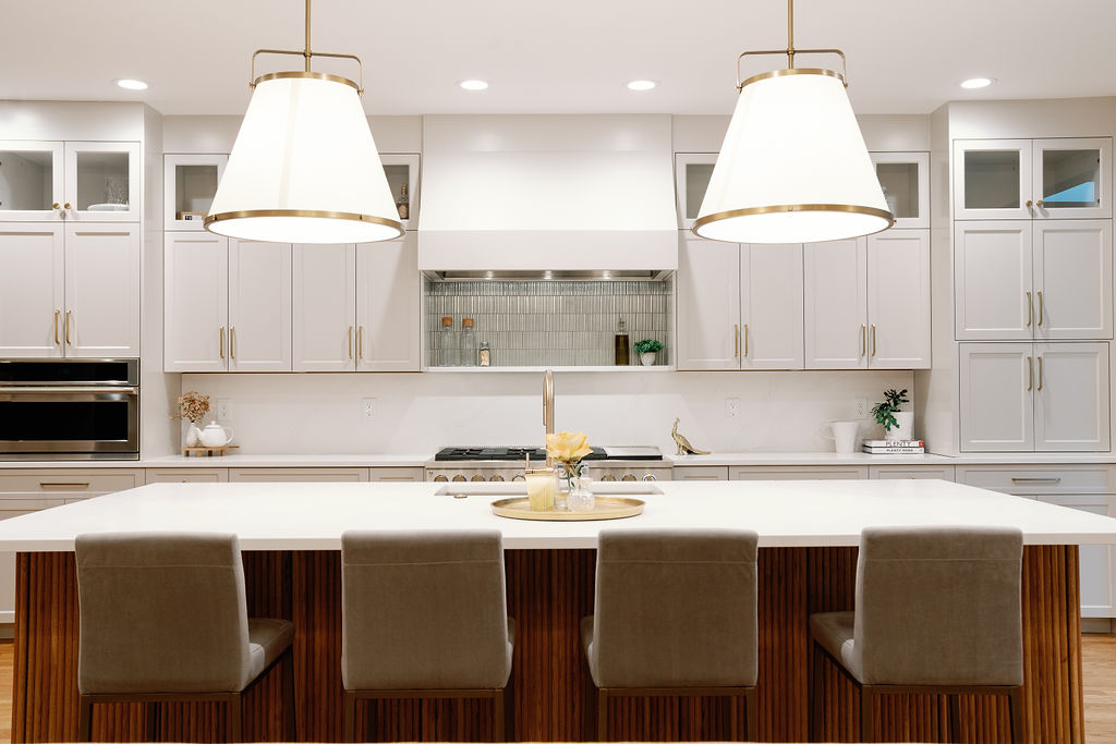 Residential kitchen renovation project. This kitchen features white cupboards and stainless steel accent appliances with gold fixtures. Contact Lotus Building Group as your kitchen remodel contractor in Nashville, TN.